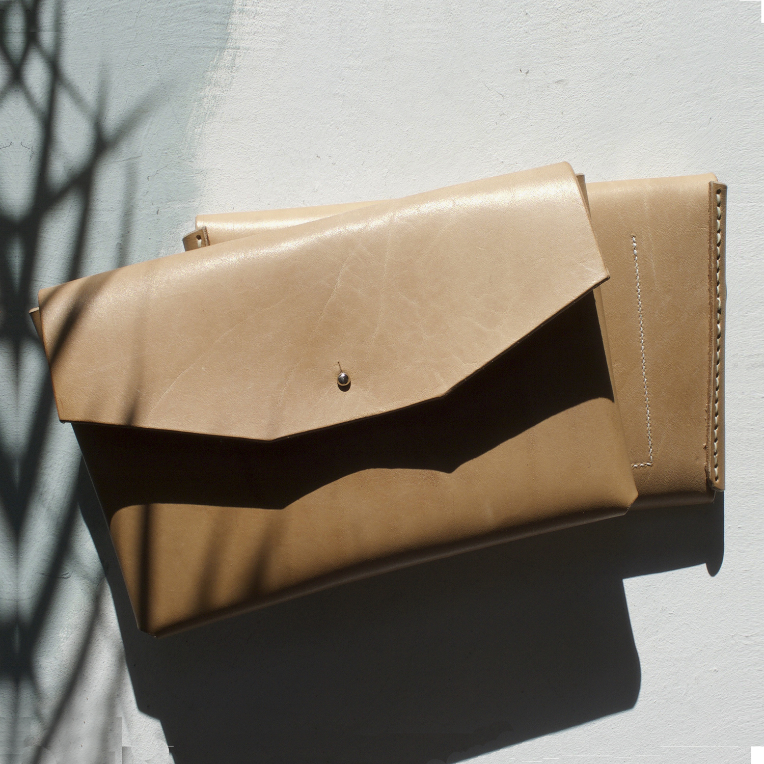 tan leather clutch bag