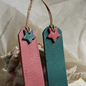 Red and turquoise leather zodiac bookmarks with star detail